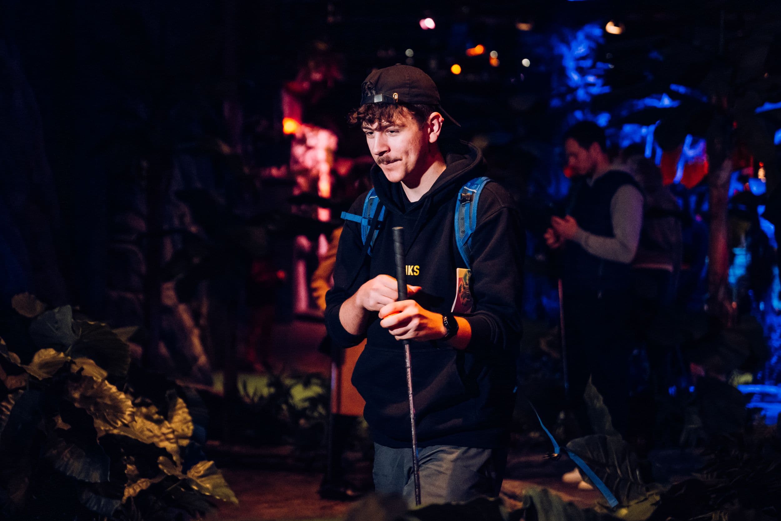 Student playing mini golf at Treetop Golf.