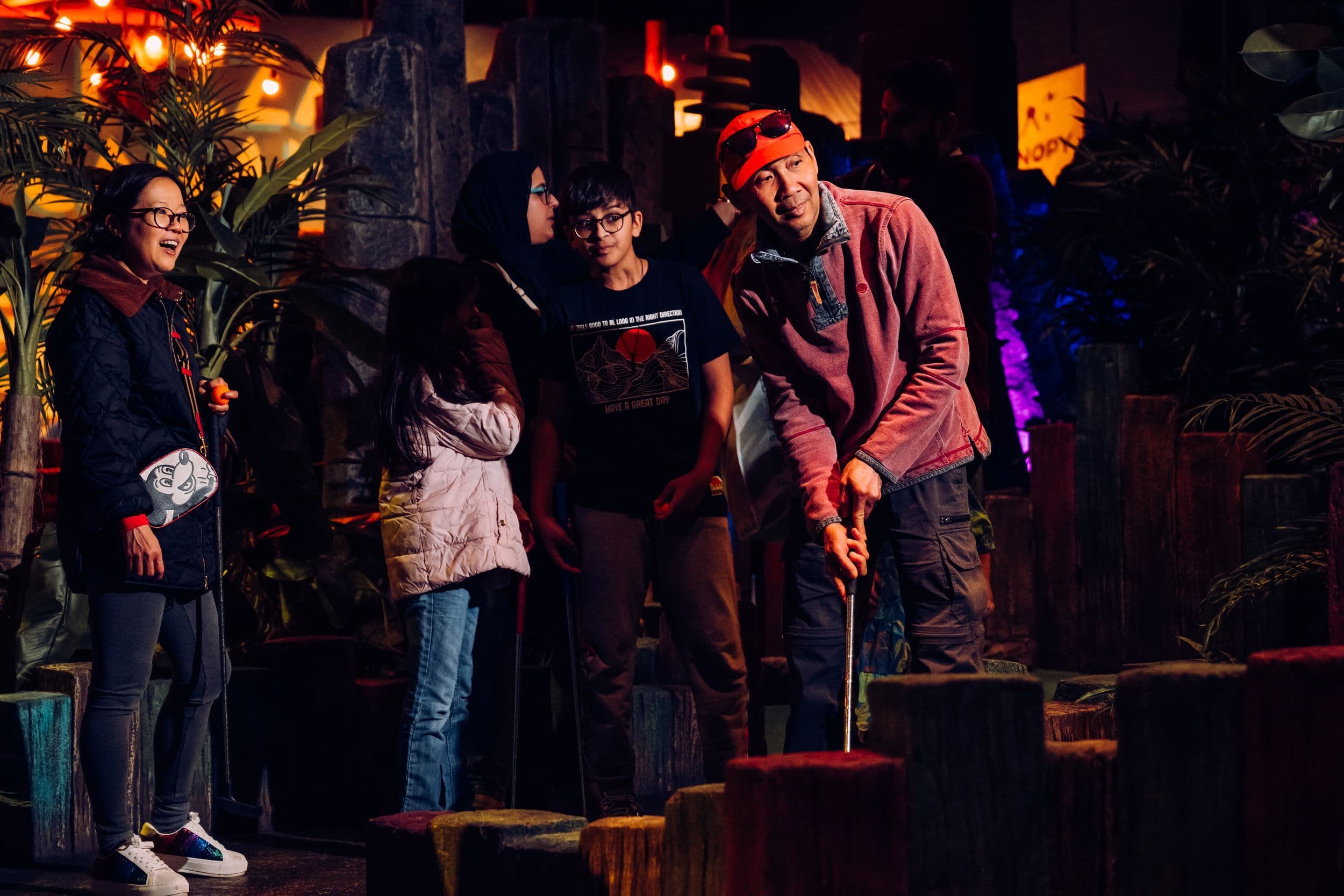 A family of 4 at the bonus 19th hole.