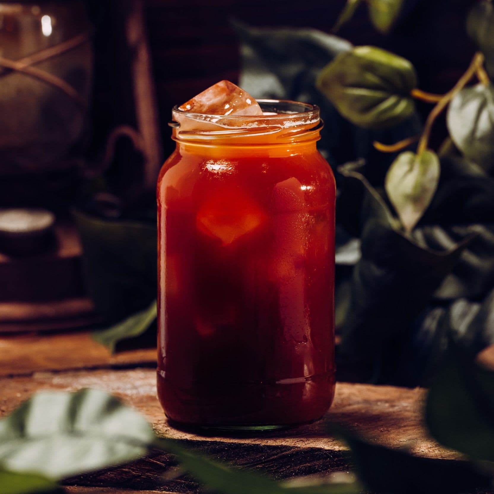 A close up image of an iced americano.